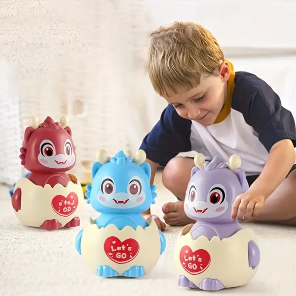 0252f32b-4f50-4fd3-b904-76b4245d6f28.webp Cute Dragon Dinosaur Eggshell Car Toy Random Colour